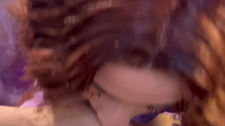 Redhead gives oral, interracial couple fucks on bed